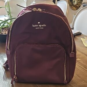 Kate Spade Purple Backpack with Structured Design and Gold Hardware